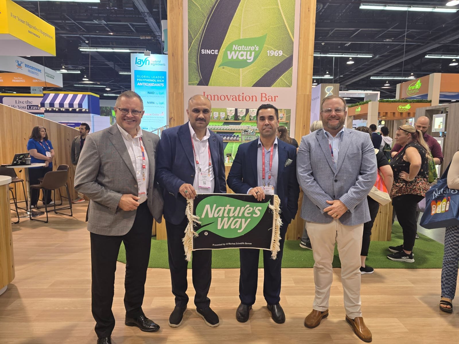 Hussein Ameen at Nature's Way booth, Expo West 2026, with Al-Washaq Scientific Bureau